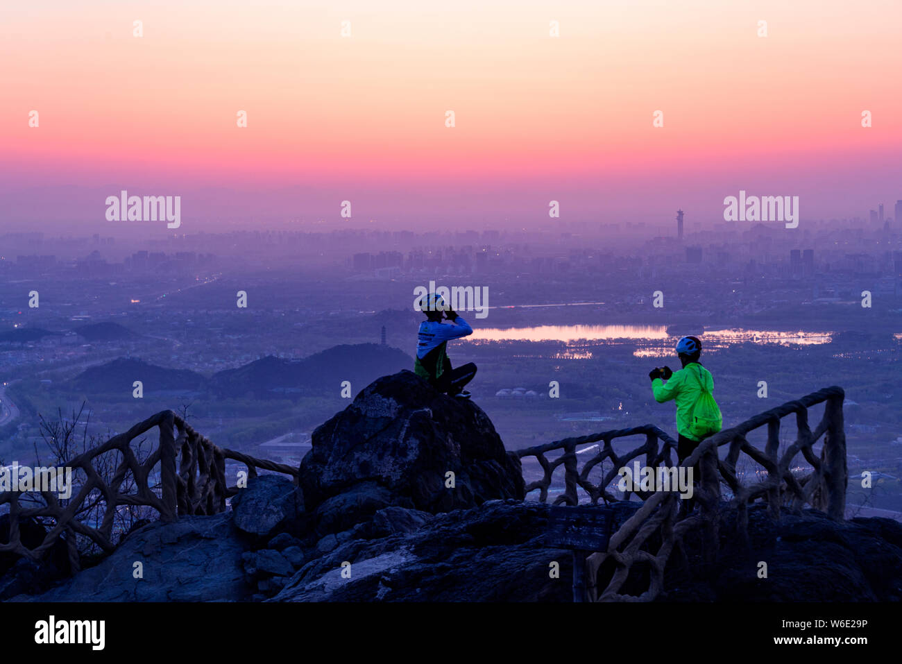 Aerial view before the sun rises over skyline viewed from the top of ...