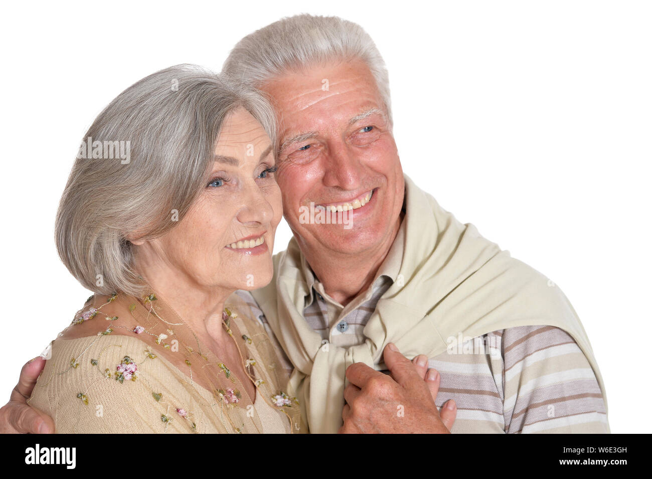 Portrait of happy senior couple holding hands Stock Photo