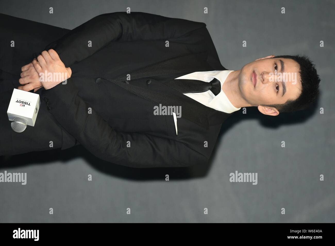 Chinese actor Huang Xiaoming attends a promotional event for 'Tissot' in Shanghai, China, 21 April 2018. Stock Photo