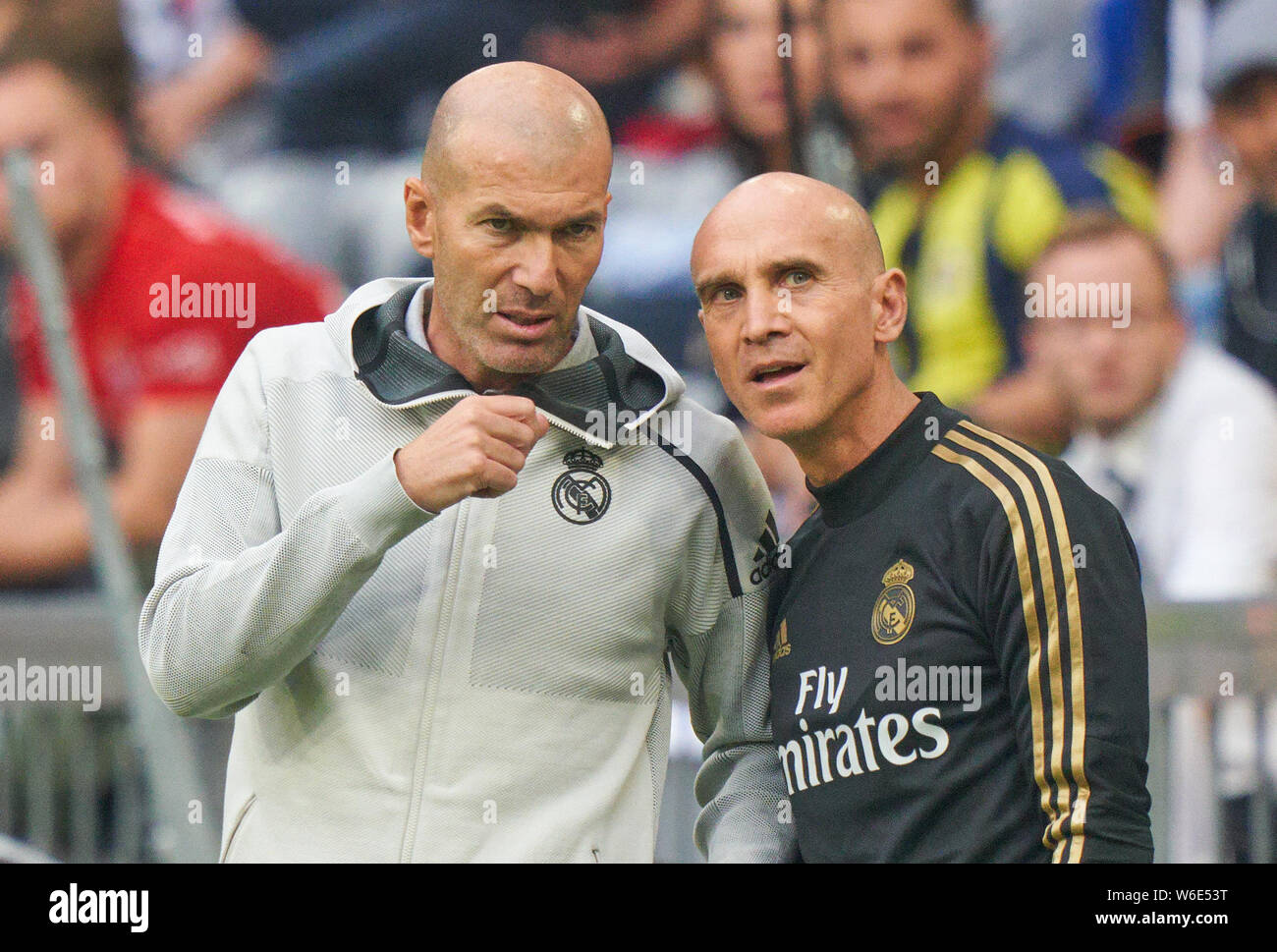 Munich, Germany. 31st July, 2019. Zinedine ZIDANE, Trainer Real Madrid  Gesticulate, with David BETTONI, Rela Madrid assistent coach, give  instructions, action, single image, gesture, hand movement, pointing,  interpret, mimik, REAL MADRID -