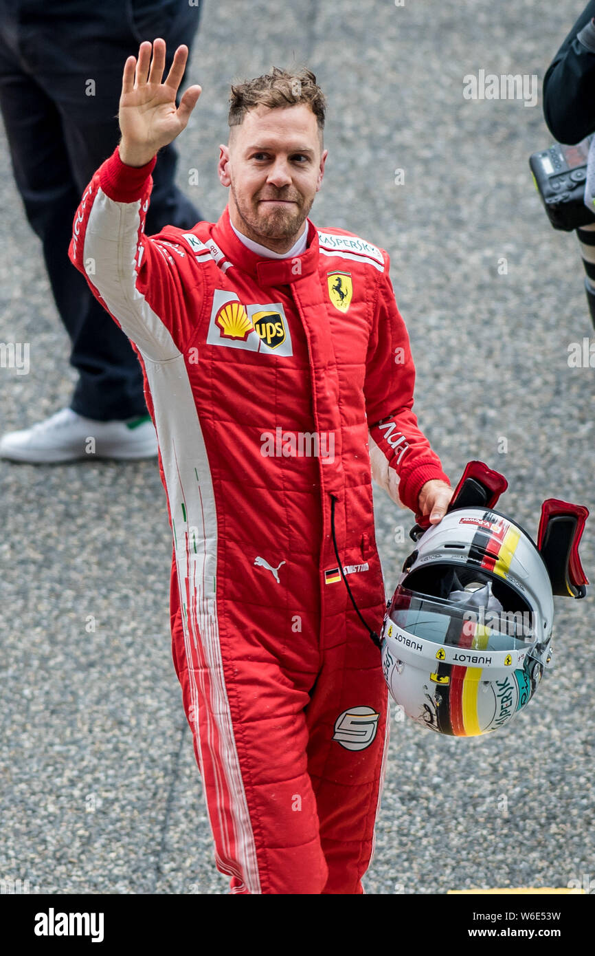 Vettel 2018 German F1 Sebastian Vettel of Ferrari reacts after winning the pole ...