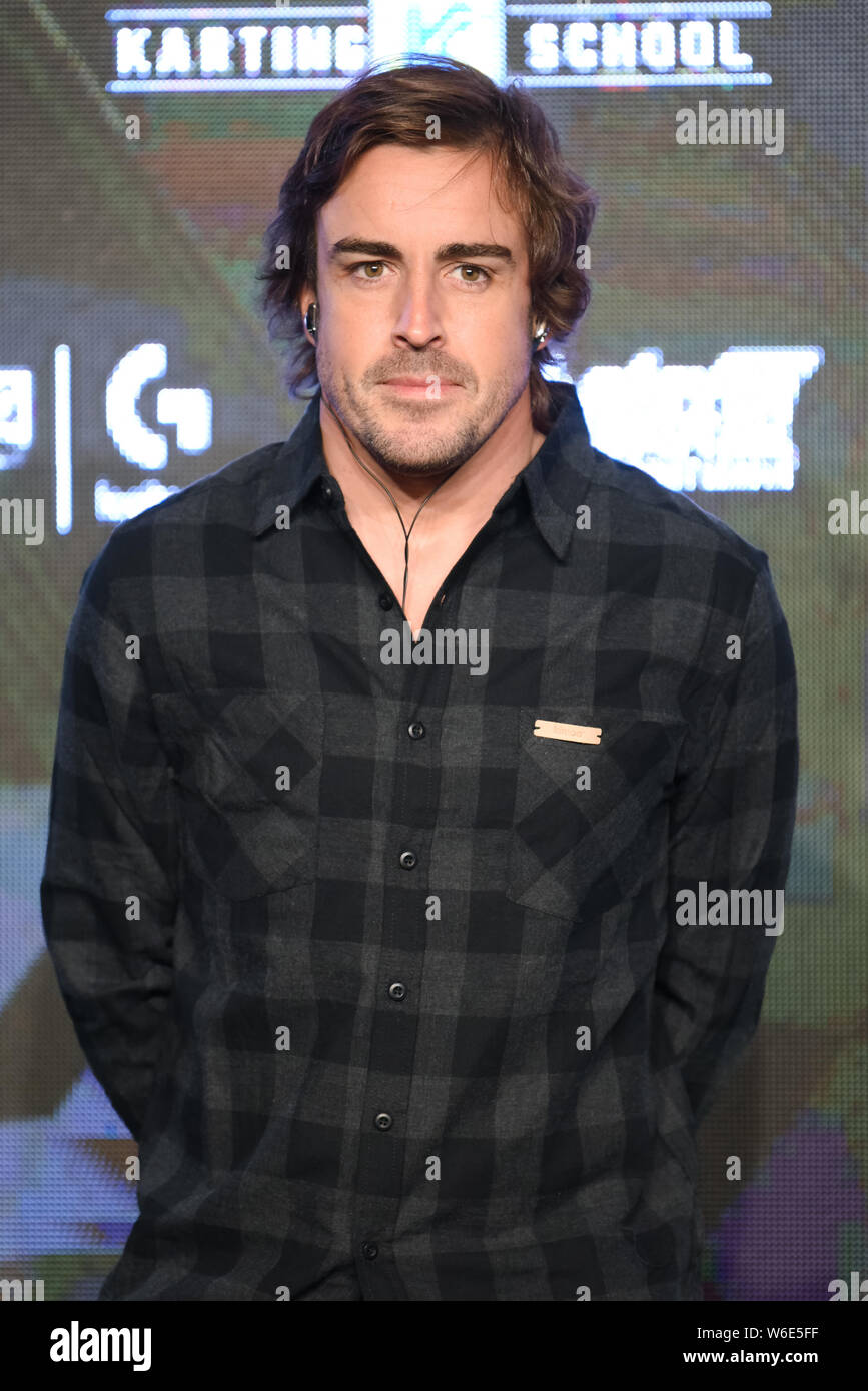 Spanish F1 driver Fernando Alonso attends the press conference for the
