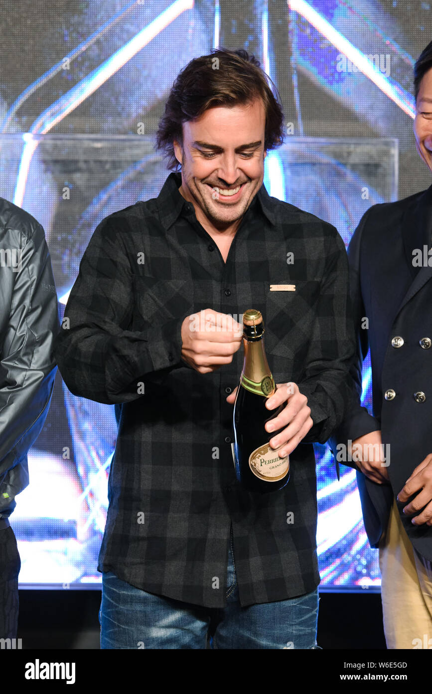 Spanish F1 driver Fernando Alonso attends the press conference for the