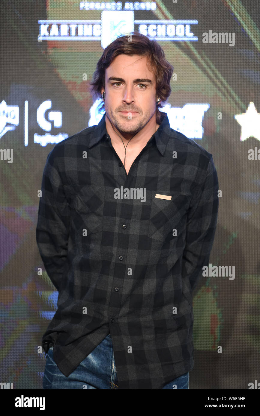 Spanish F1 driver Fernando Alonso attends the press conference for the