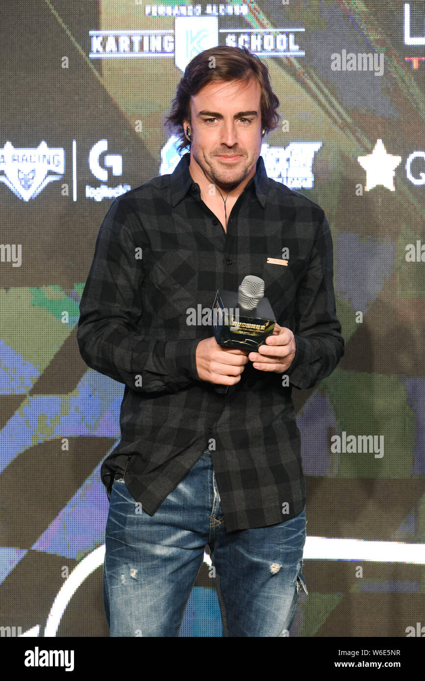 Spanish F1 driver Fernando Alonso attends the press conference for the