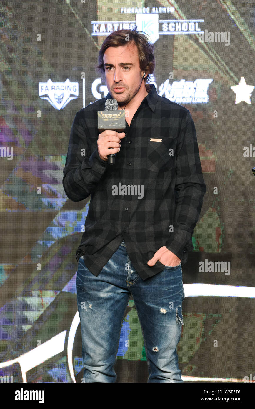 Spanish F1 driver Fernando Alonso attends the press conference for the