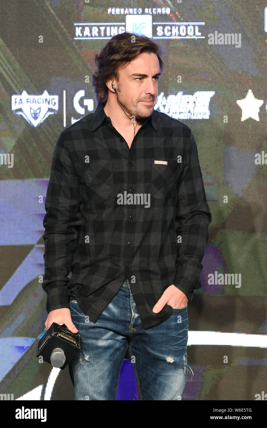 Spanish F1 driver Fernando Alonso attends the press conference for the