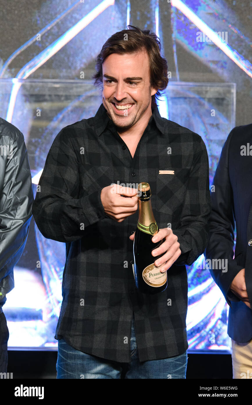 Spanish F1 driver Fernando Alonso attends the press conference for the