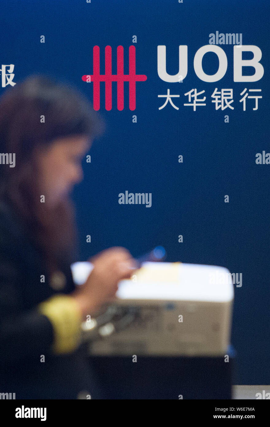 --FILE--View of a logo of Singapore-based United Overseas Bank (UOB) during a forum in Shanghai, China, 8 April 2013.   Chinese fintech platform Pinte Stock Photo