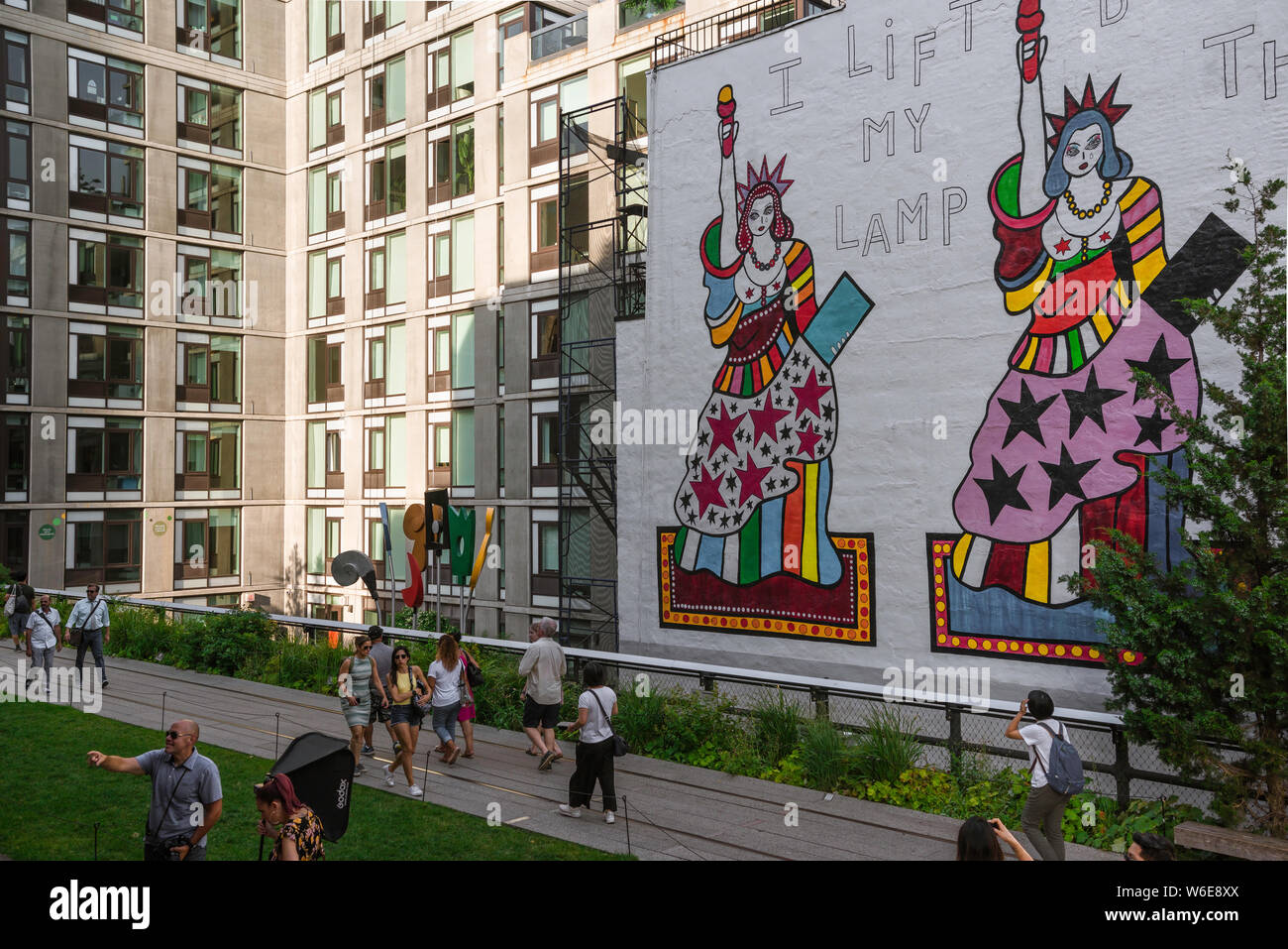 New York High Line, view of people in summer walking the High Line park ...