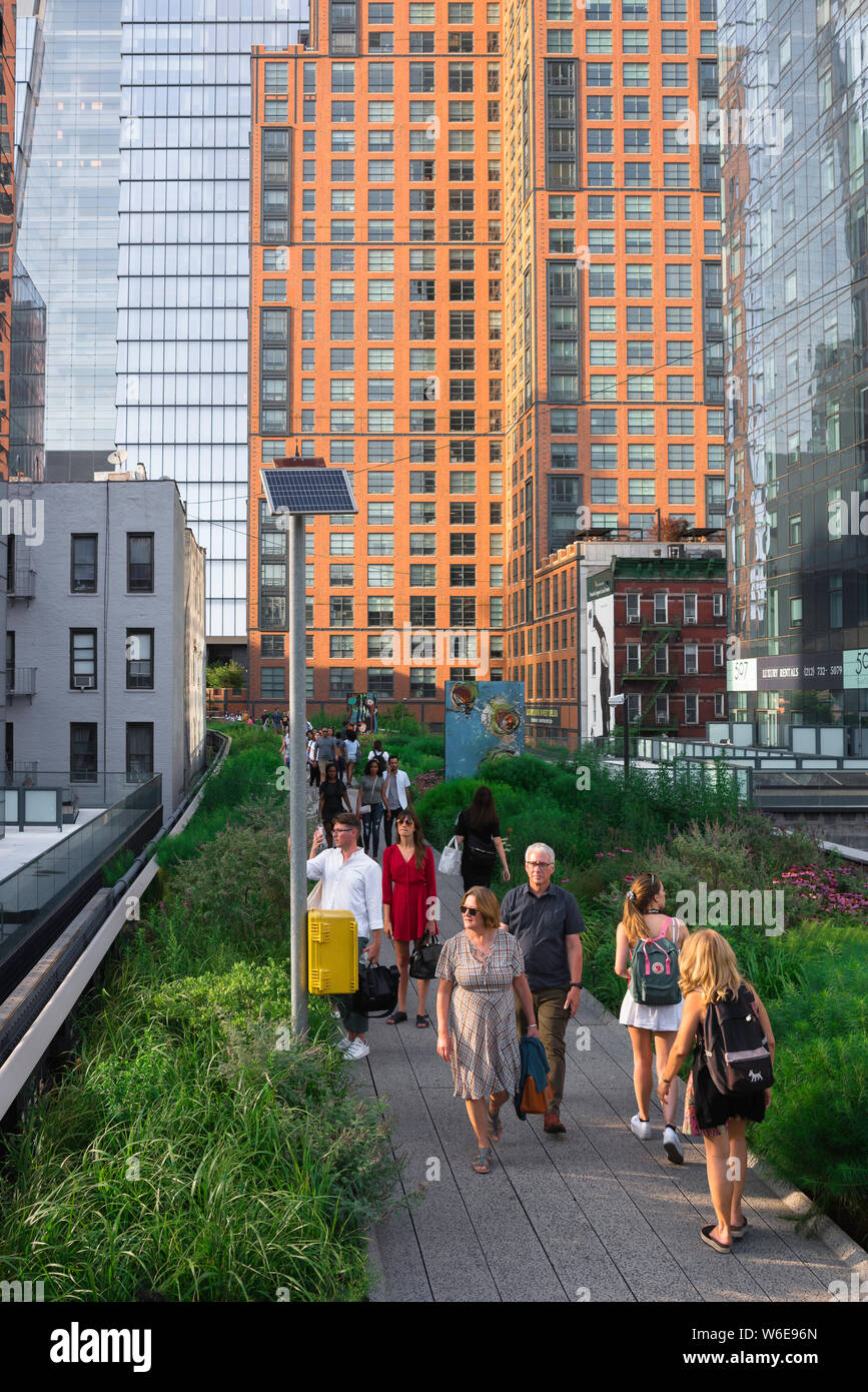 High Line New York, view of people in summer walking the High Line park
