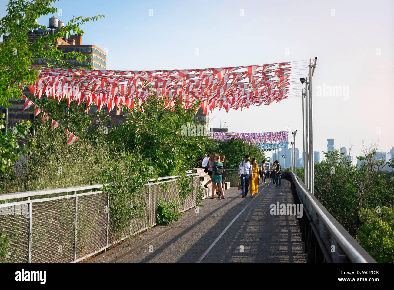 Chelsea High Line, view of people on a summer evening walking the High Line park in the Chelsea neighborhood of Manhattan, New York City, USA. Stock Photo