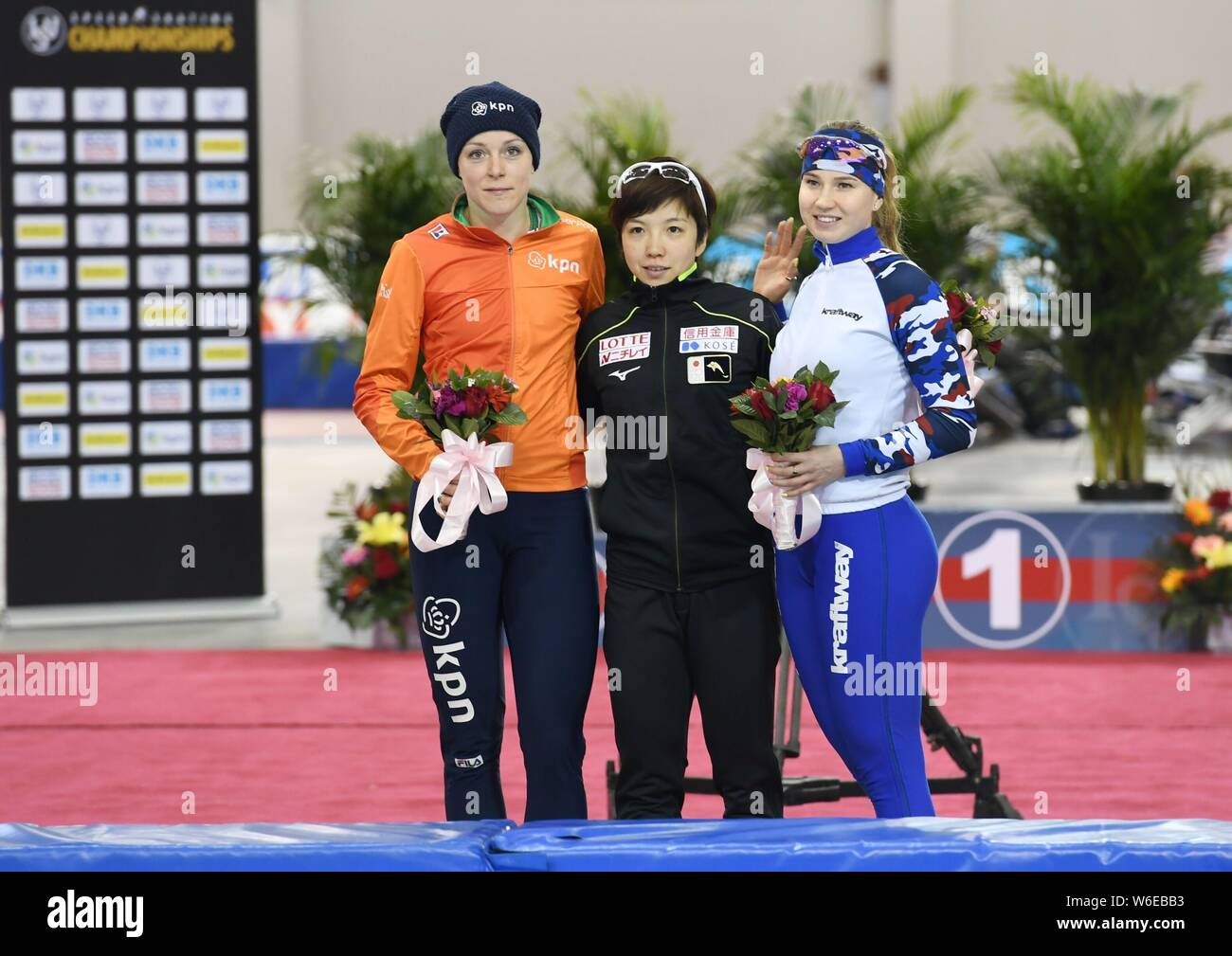 (From left) Second runner-up Jorien ter Mors of the Netherlands, winner Nao Kodaira of Japan and first runner-up Angelina Golikova of Russia pose on t Stock Photo