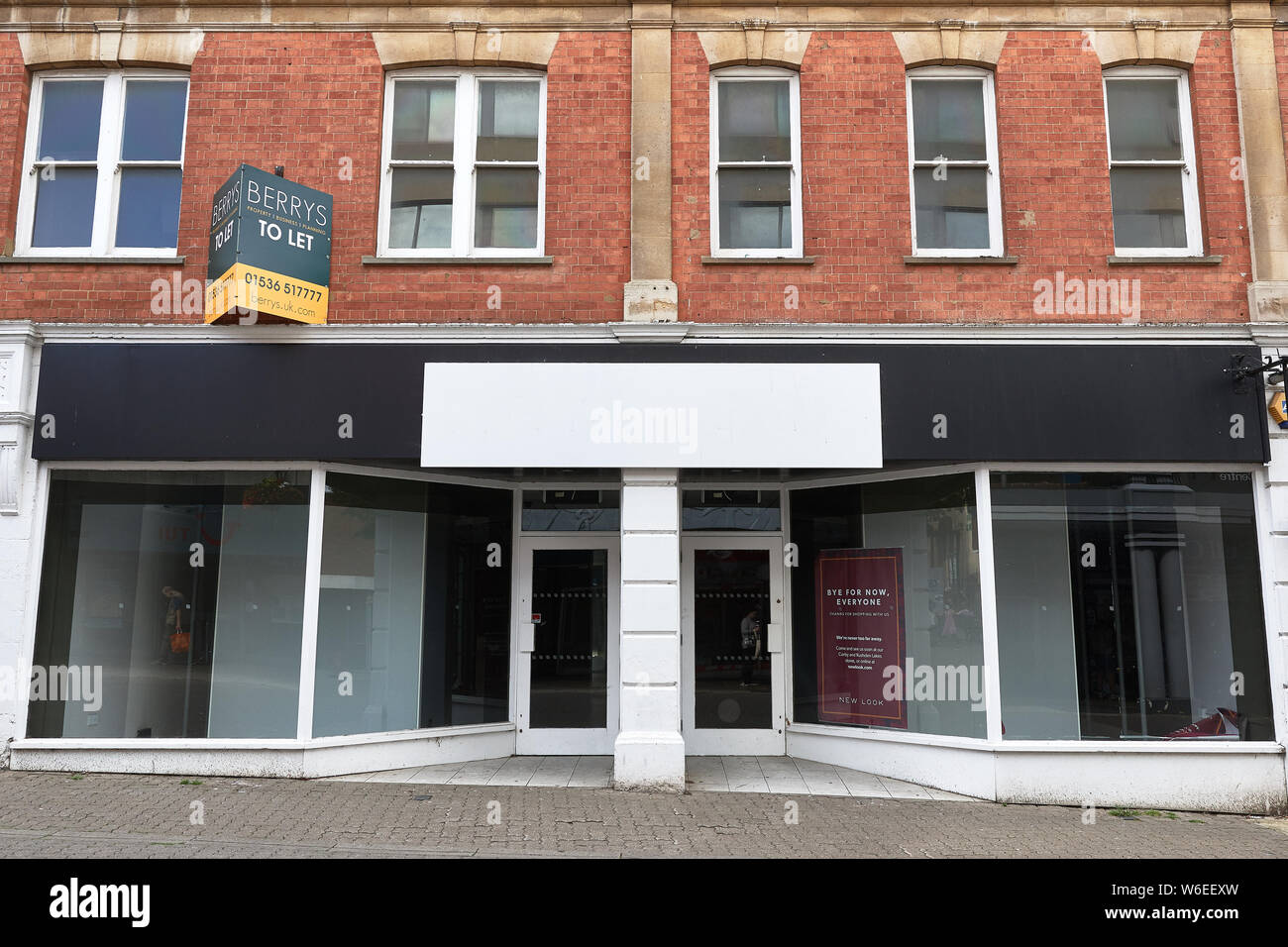 Empty, vacant, unused shop premises in the town centre of Kettering, England. Stock Photo