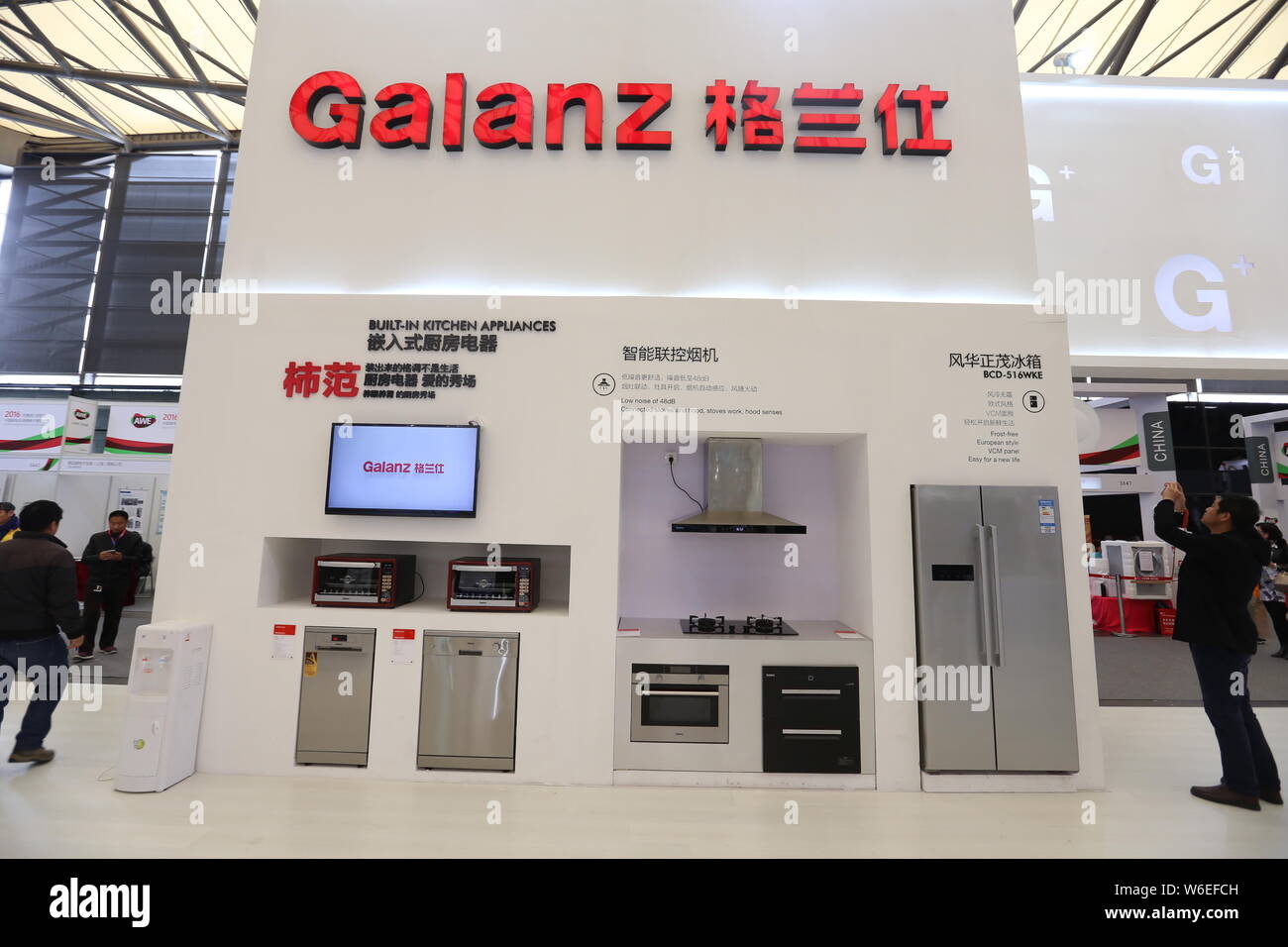 --FILE--People visit the stand of Chinese home appliance manufacturer Galanz during the 15th Appliance&electronics World Expo in Shanghai, China, 9 Ma Stock Photo