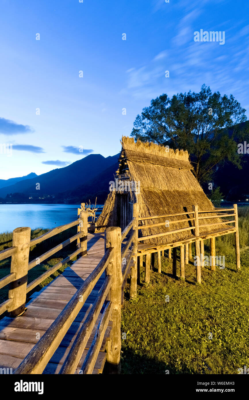 Stilt house of the Bronze Age (reconstruction) at the museum of the Palafitte of Lake Ledro. Molina di Ledro, Trento province, Trentino, Italy. Stock Photo