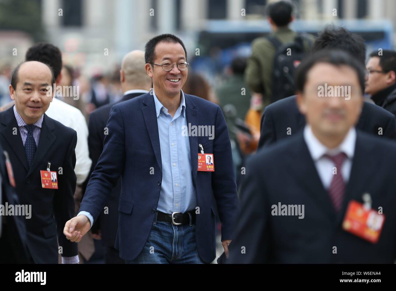 Michael Yu Minhong, founder and CEO of New Oriental Education & Technology Group, arrives at the Great Hall of the People to attend the closing meetin Stock Photo
