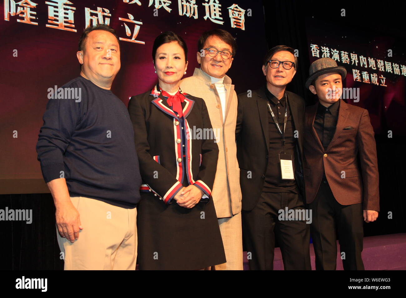 (From left) Hong Kong actor and film director Eric Tsang Chi-wai, actress Liza Wang Ming-chuen, and kungfu star Jackie Chan attend the launch ceremony Stock Photo
