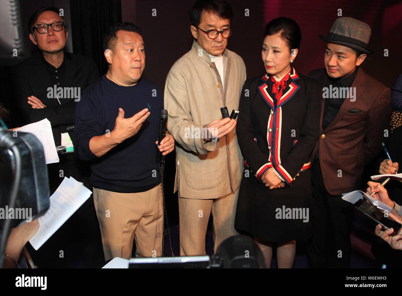 (From left) Hong Kong actor and film director Eric Tsang Chi-wai, actress Liza Wang Ming-chuen, and kungfu star Jackie Chan attend the launch ceremony Stock Photo
