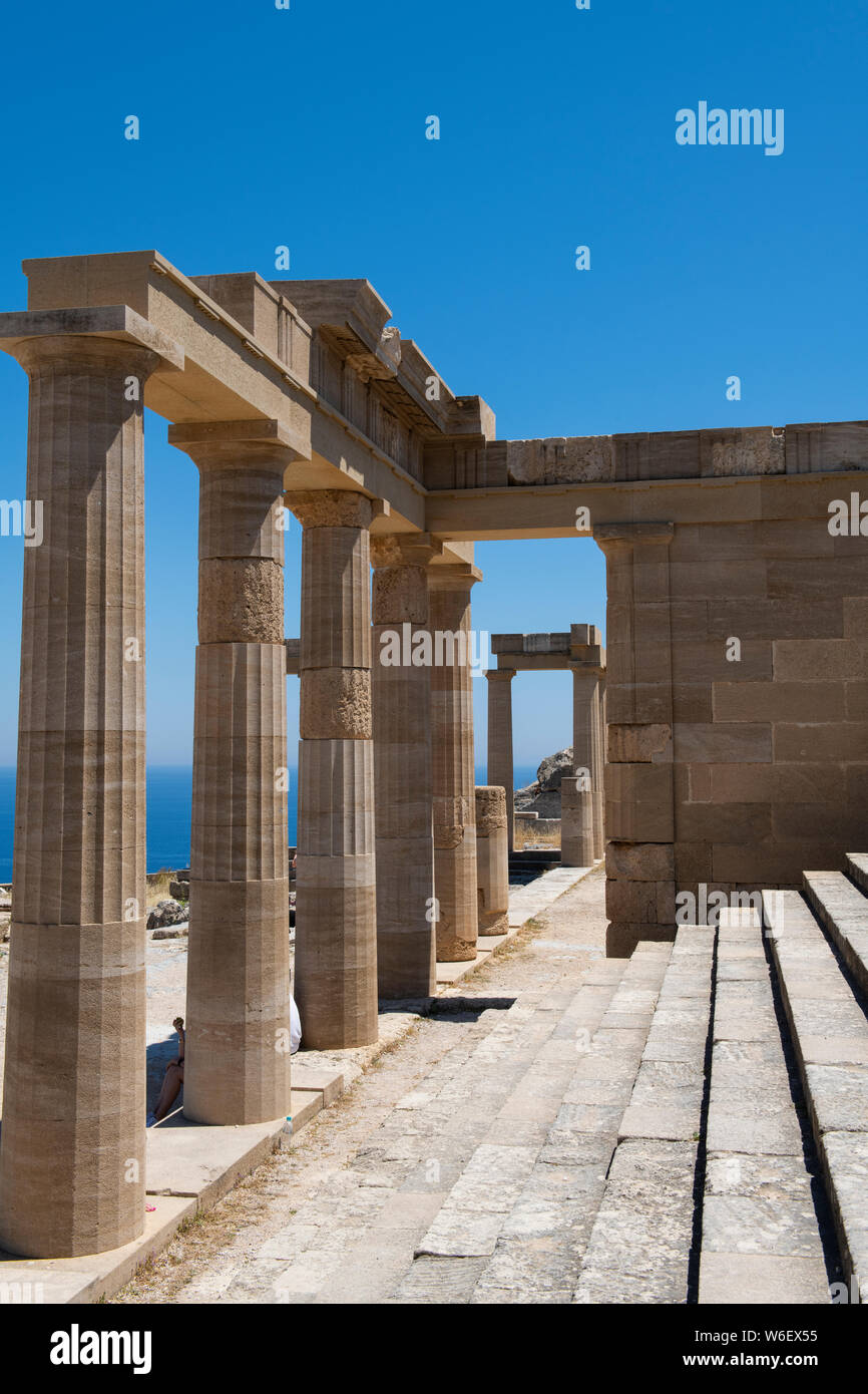 Greece, Rhodes, the largest of the Dodecanese islands. Historic Lindos, medieval Acropolis of Lindos. 4th century B.C. Doric style Temple. Stock Photo