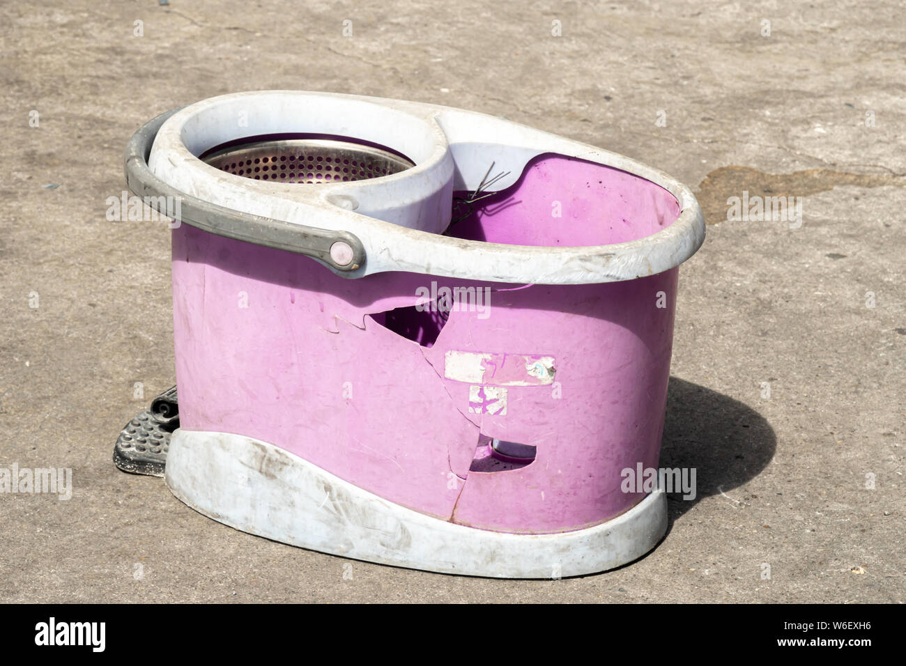 broken old plastic mop bucket Stock Photo Alamy