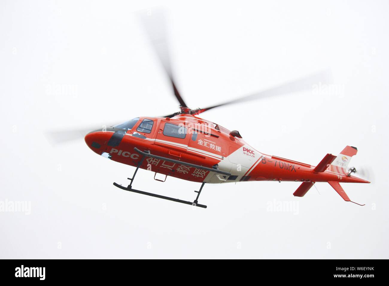 A medical helicopter to offer free air medical services takes off in Zhengzhou city, central China's Henan province, 20 March 2018.    A hospital in c Stock Photo
