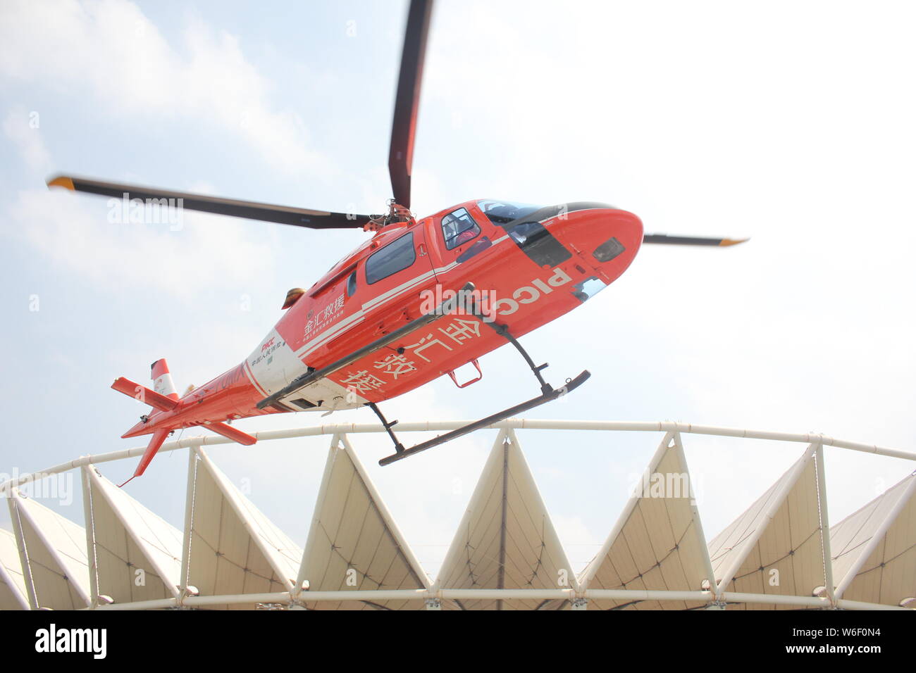 --FILE--A medical helicopter to offer free air medical services takes off in Zhengzhou city, central China's Henan province, 22 September 2017.    A h Stock Photo