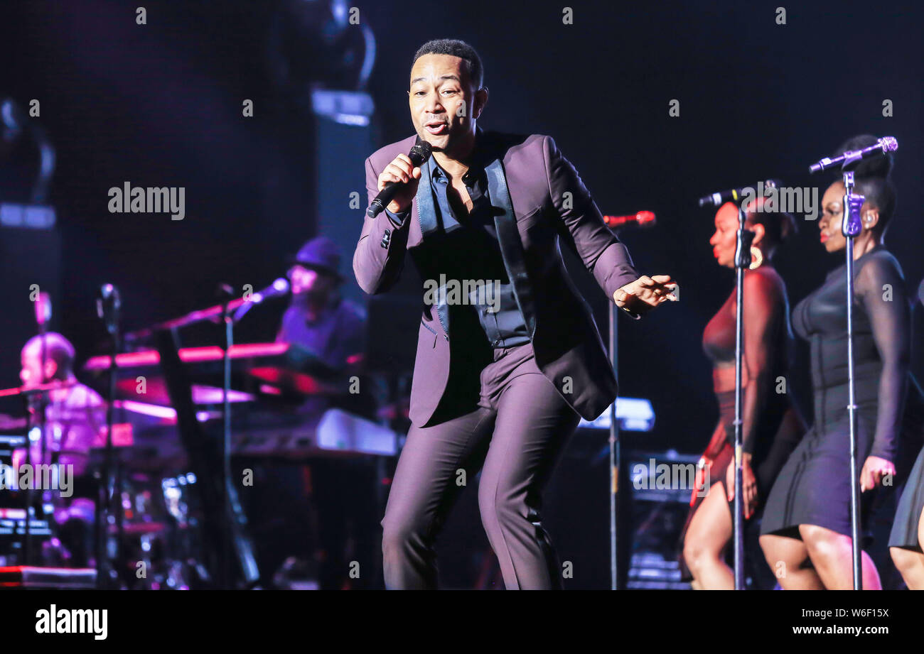 American singer and actor John Roger Stephens, known professionally as John Legend, performs at a concert in Shanghai, China, 8 March 2018. Stock Photo