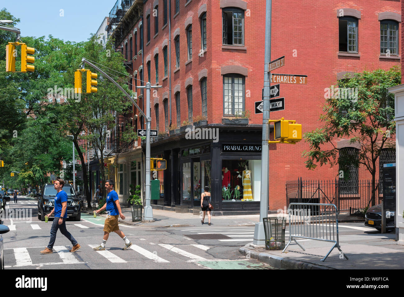 Bleeker Street NYC, view in summer of people crossing Bleeker Street in the West (Greenwich) Village, New York City, USA Stock Photo