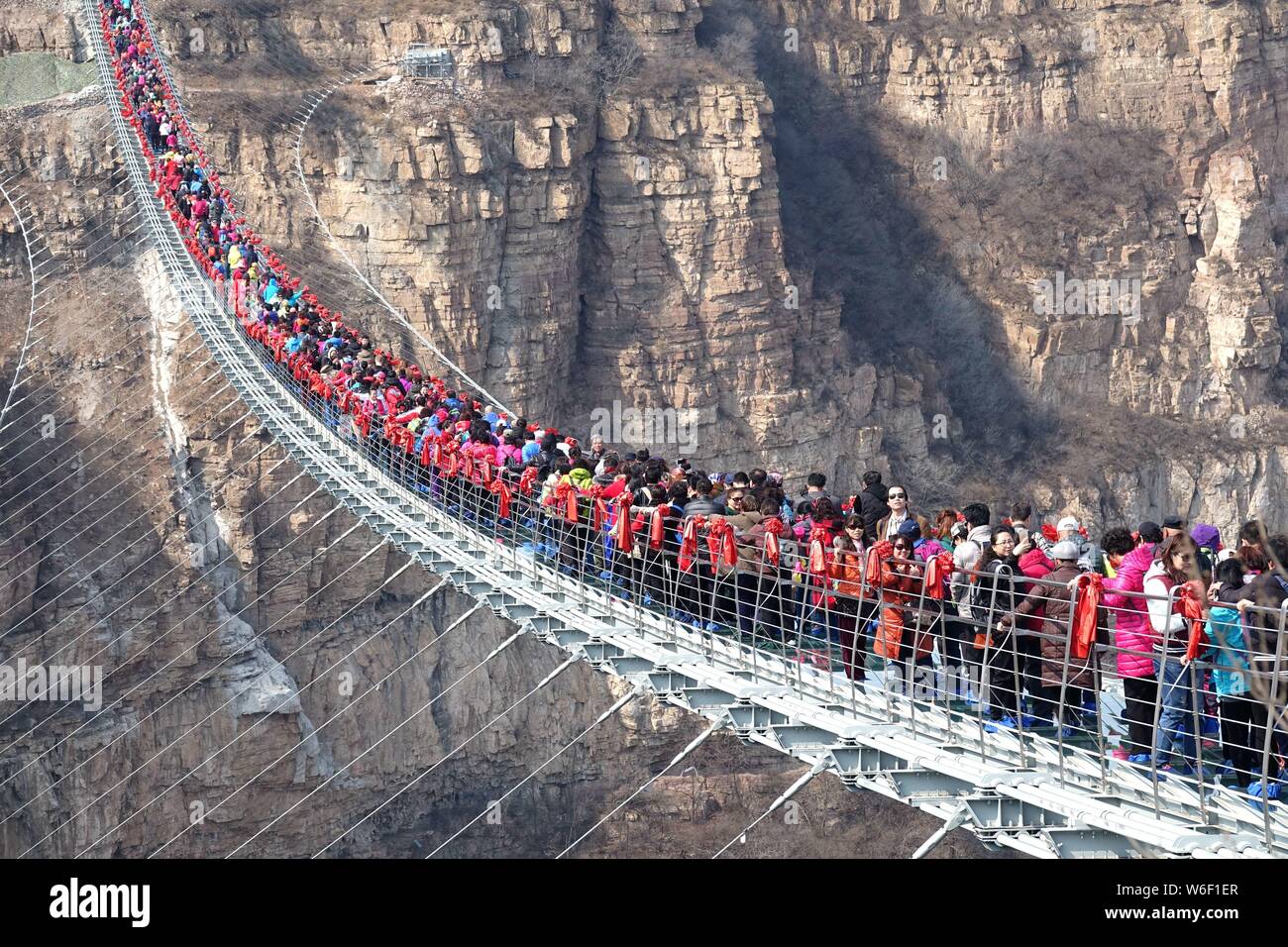 Tourists Throng To Walk On The World s Longest Glass Bridge In The tourists-throng-to-walk-on-the-world-s-longest-glass-bridge-in-the