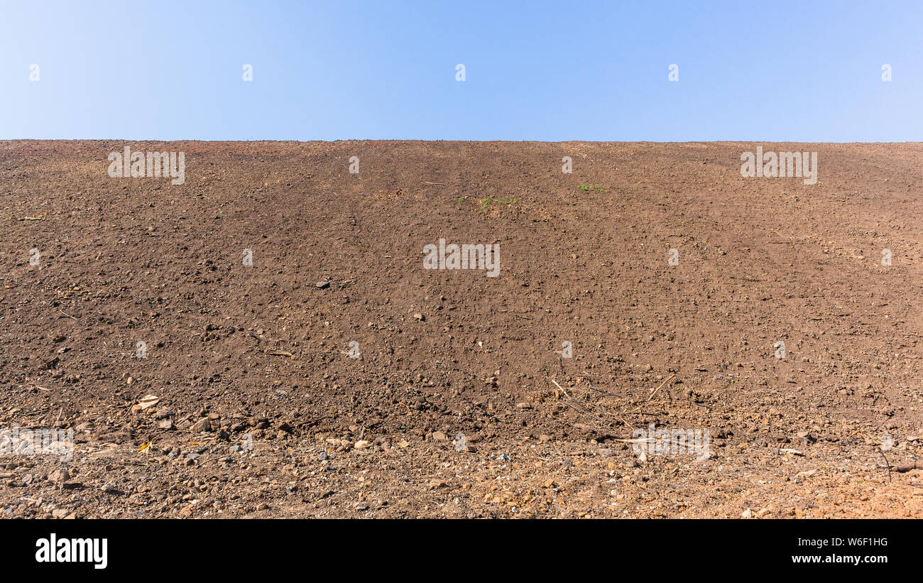 Construction earthworks new raw earth sandbank embankment of new top