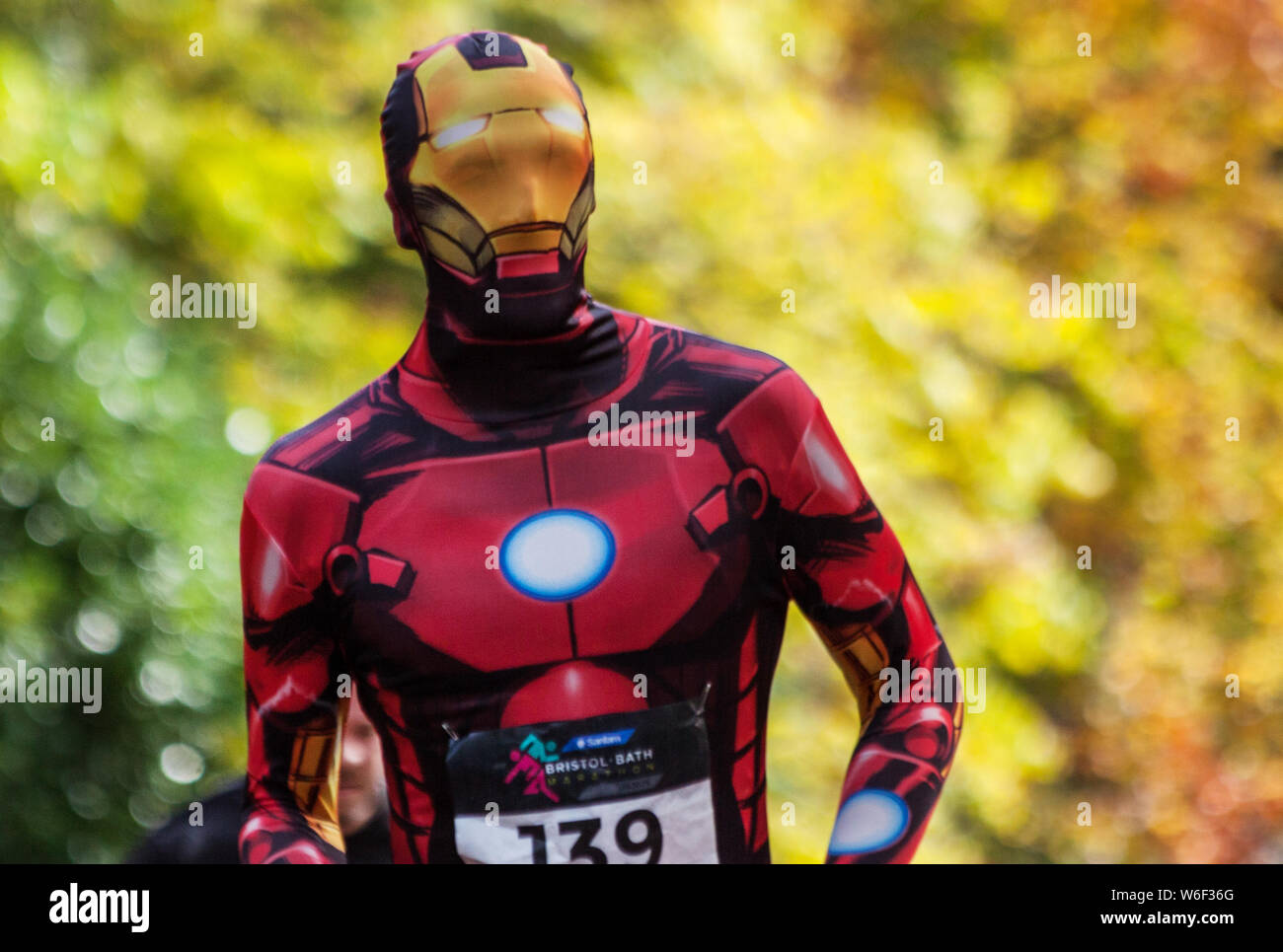 Runner in hilarious fancy dress costume during a charity running event. Stock Photo