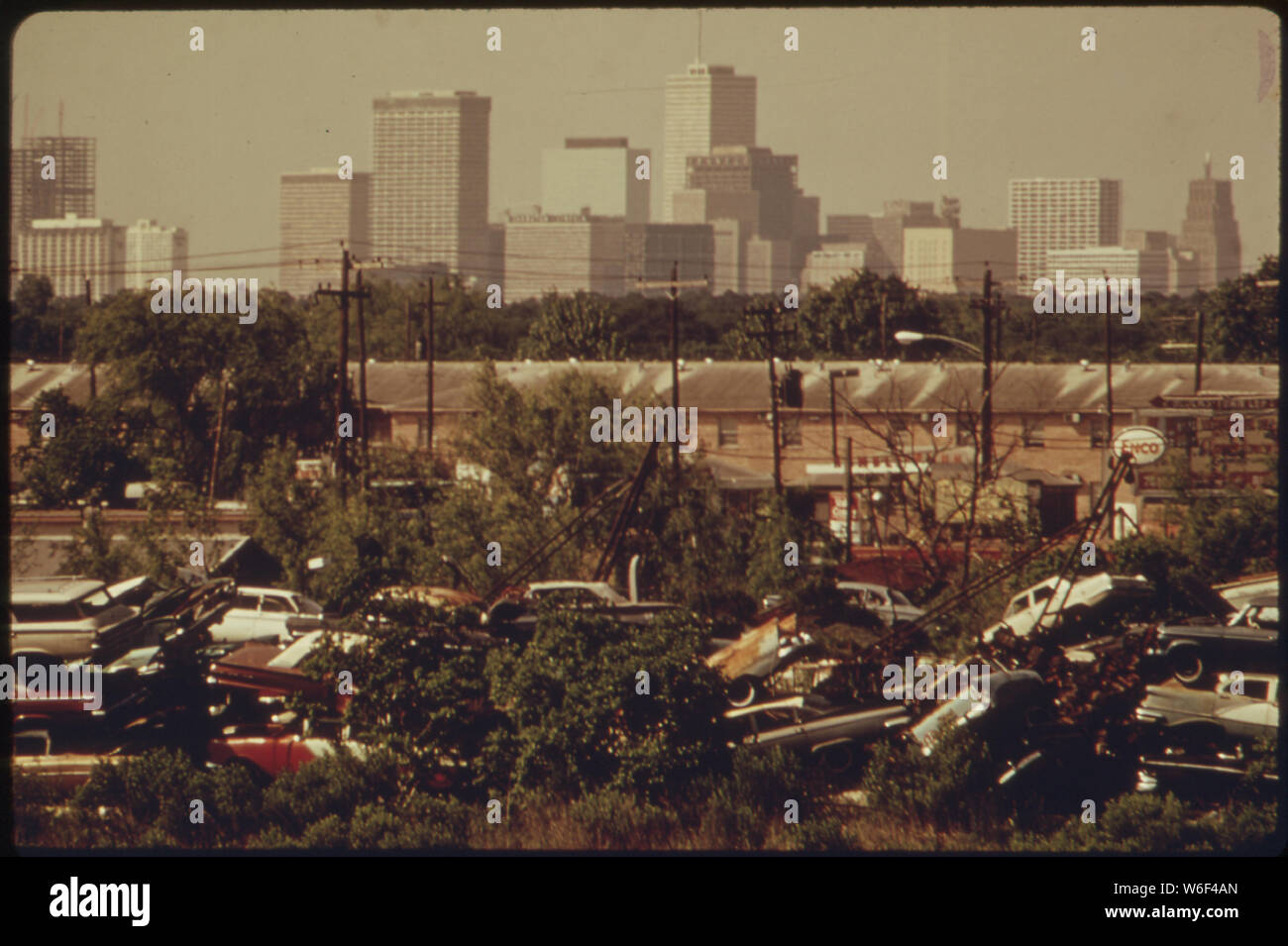 AUTOMOBILE JUNKYARD WITH HOUSTON SKYLINE IN BACKGROUND Stock Photo Alamy