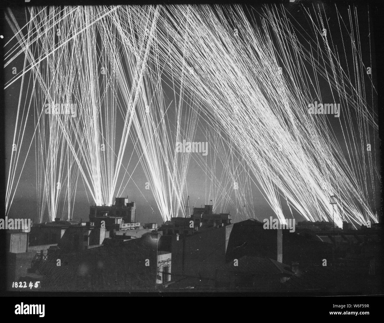 Ack-Ack fire during an air raid on Algiers, by the Nazis.; General notes:  Use War and Conflict Number 1018 when ordering a reproduction or requesting information about this image. Stock Photo