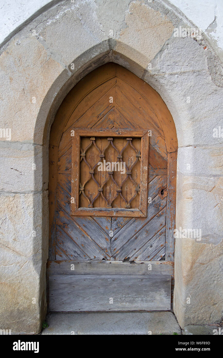 door of a chapel on the grounds of the Town Parish Church of the Assumption of Mary, Deggendorf, Bavarian Forest, Lower Bavaria, Germany Stock Photo