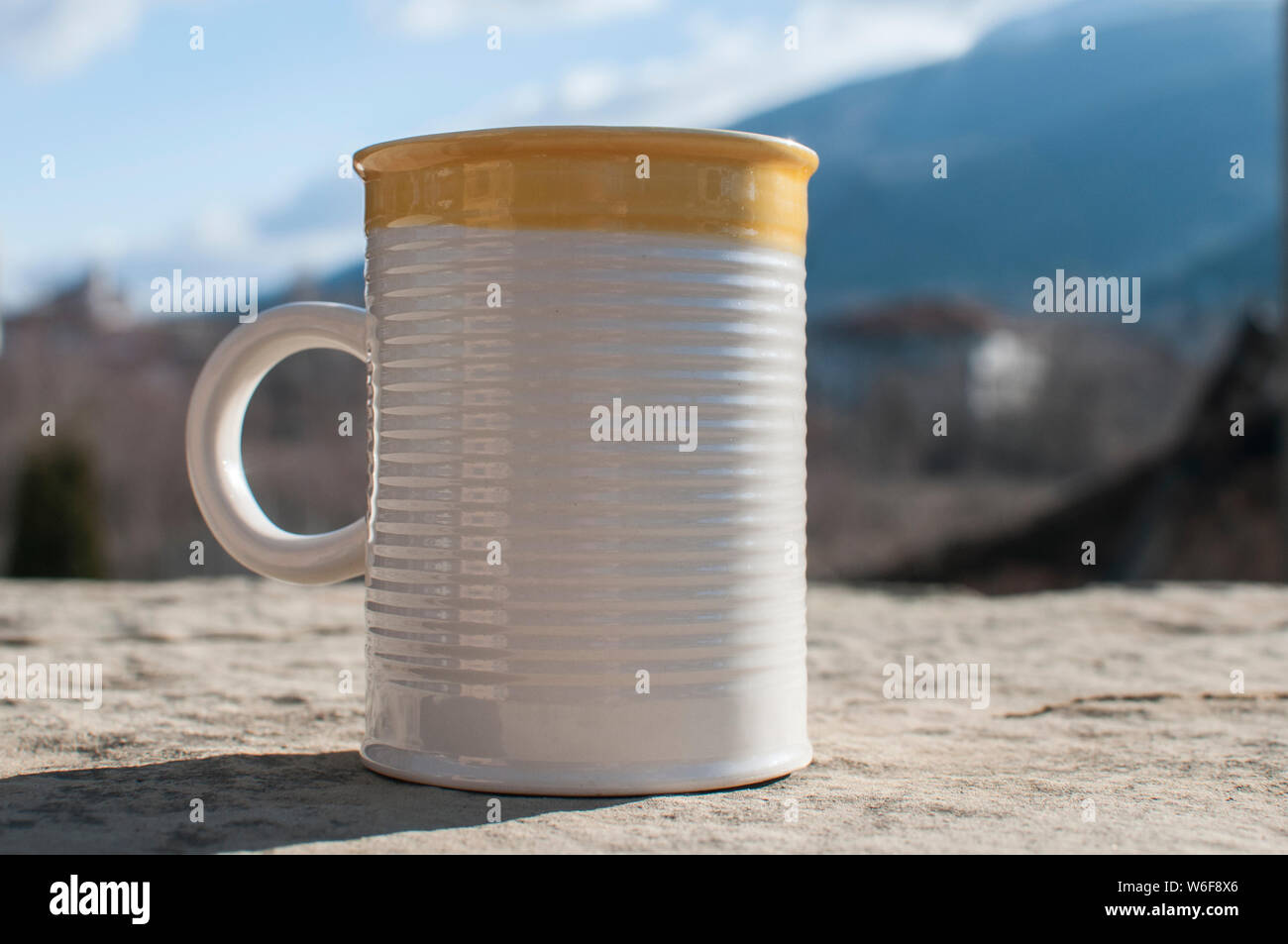 Ceramic tea mug closeup on stone surface closeup Stock Photo