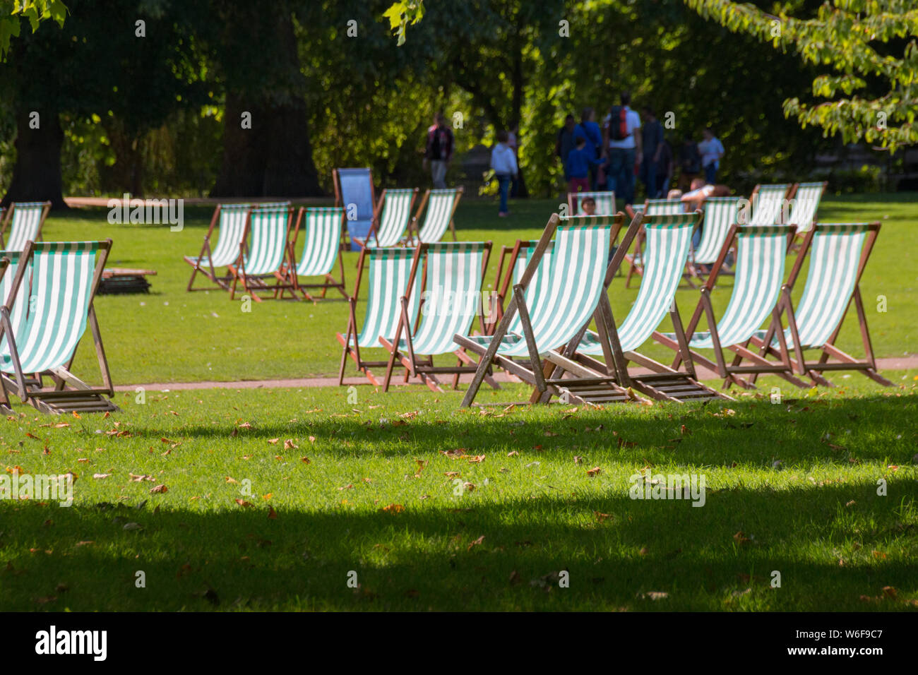 Comfortable deck chair inviting people to relax on summer day in