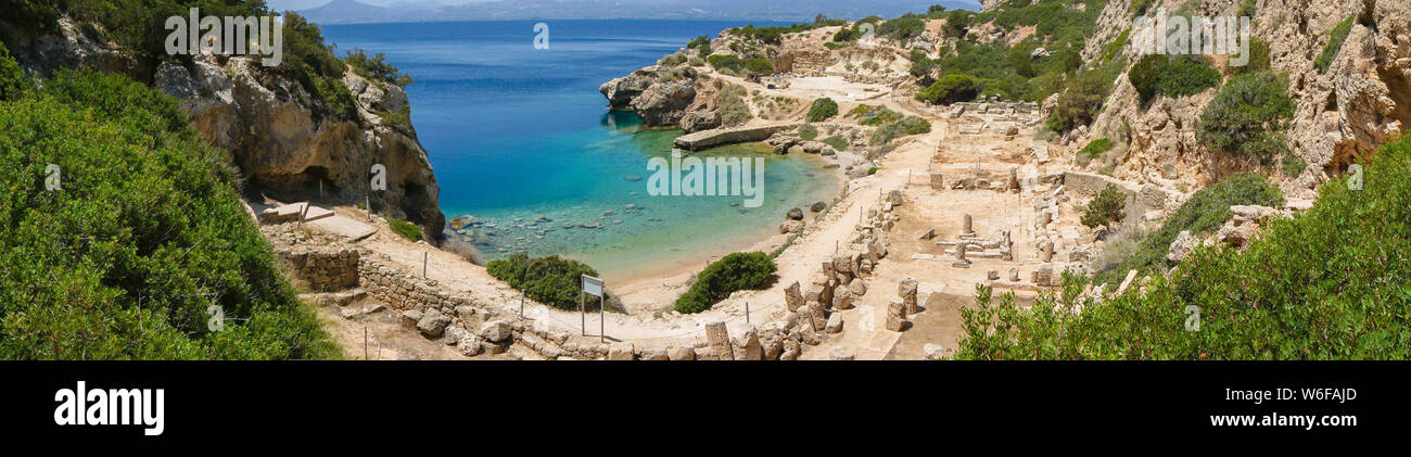 Panorama of the L- shaped stoa and a small beach at the archaeological site of Heraion, sanctuary of goddess Hera, in Perachora, Loutraki, Greece Stock Photo