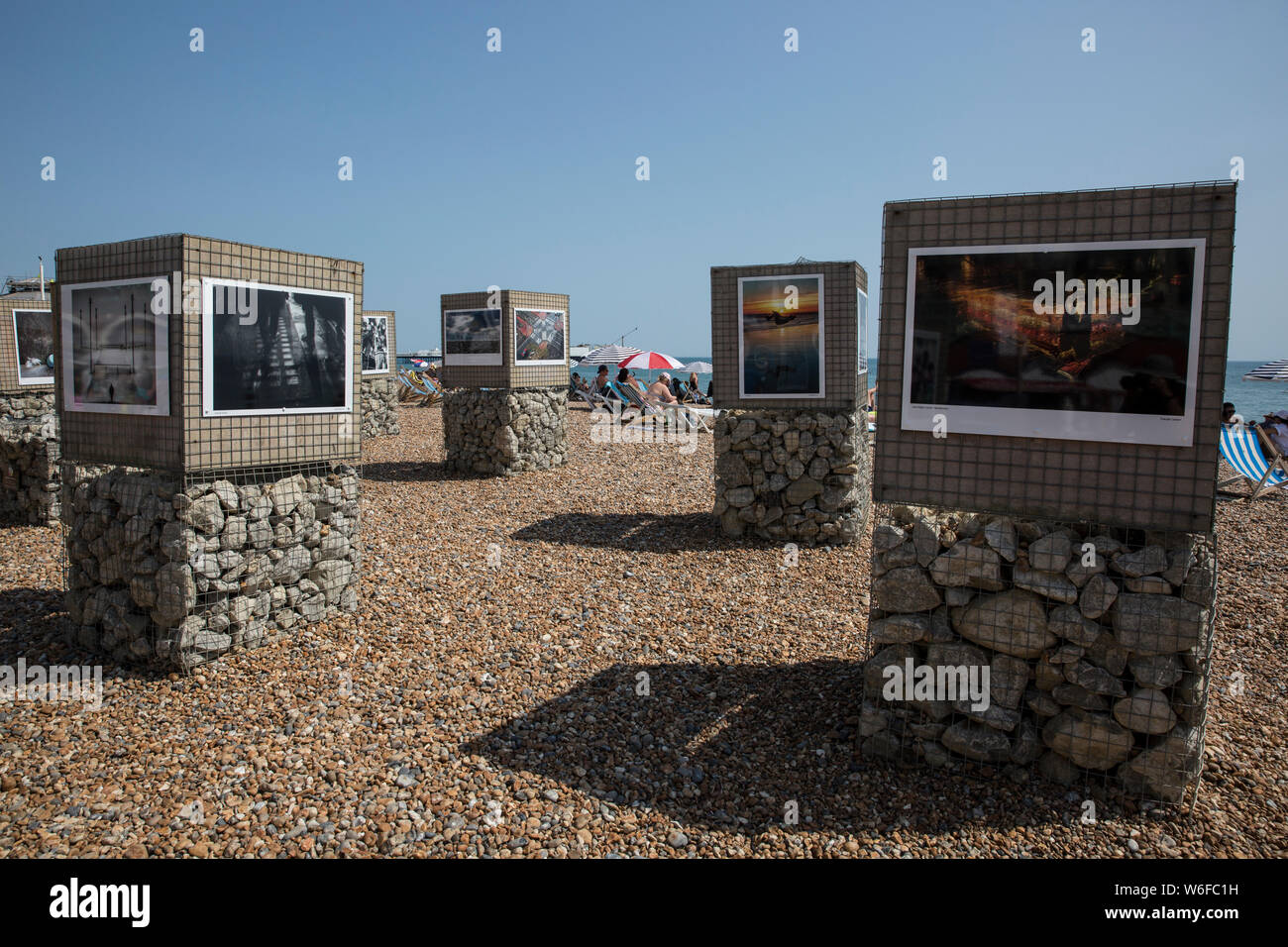 Outdoors photography exhibition presented on Brighton beach, Brighton Seafront, seaside town in the county of East Sussex, England, United Kingdom Stock Photo