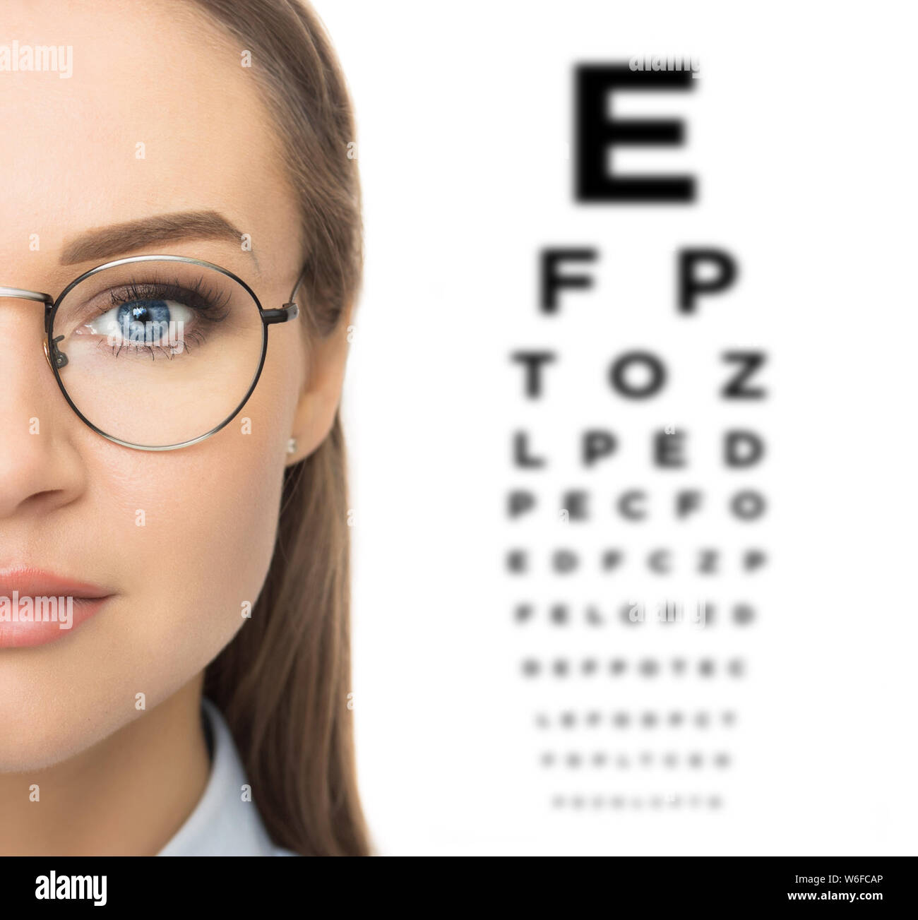hands holding optometrist trial frame Stock Photo