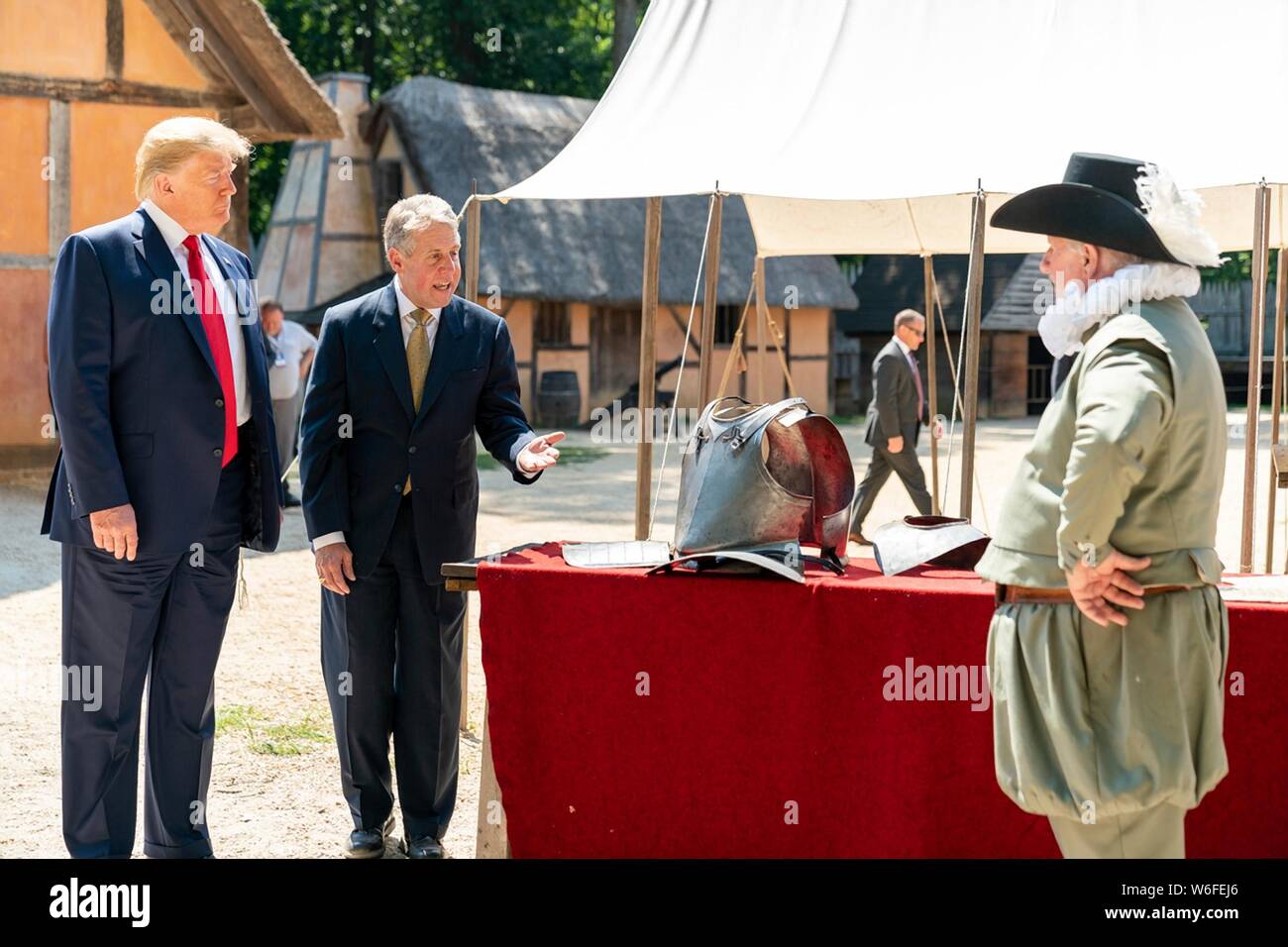 U.S President Donald Trump tours the James Fort replica with Philip Emerson, Executive Director of the James-Yorktown Foundation, at Jamestown Settlement Museum July 30, 2019 in Williamsburg, Virginia. Stock Photo