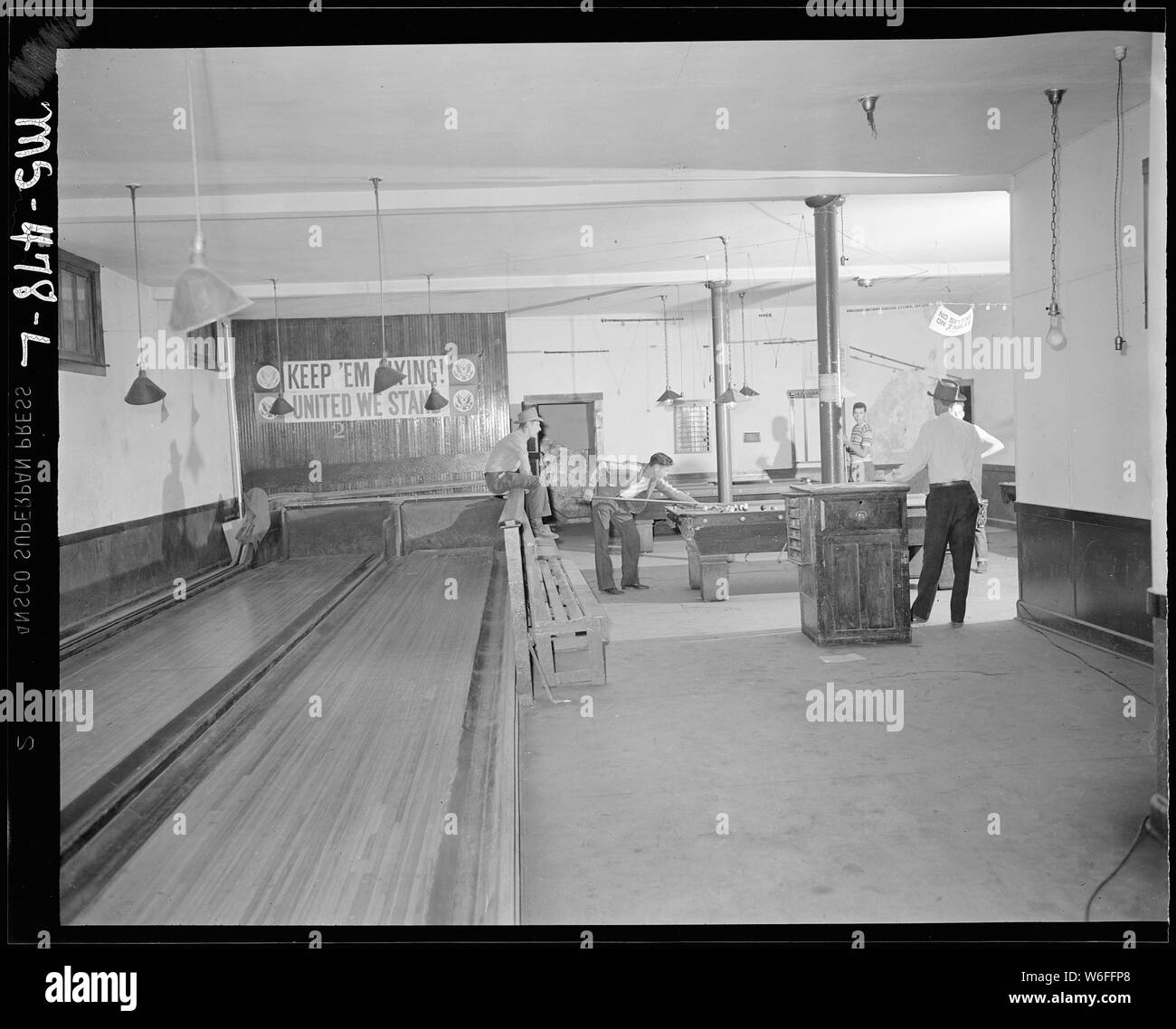 Bowling alley and pool hall in recreation building in the town. United