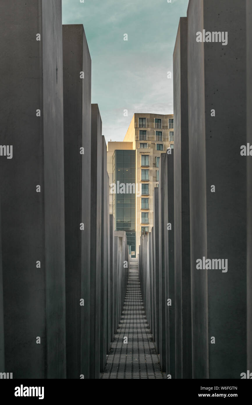BERLIN, GERMANY - SEPTEMBER 26, 2018: Memorial to the Murdered Jews of Europe, with a focus in a building at the end of the path Stock Photo