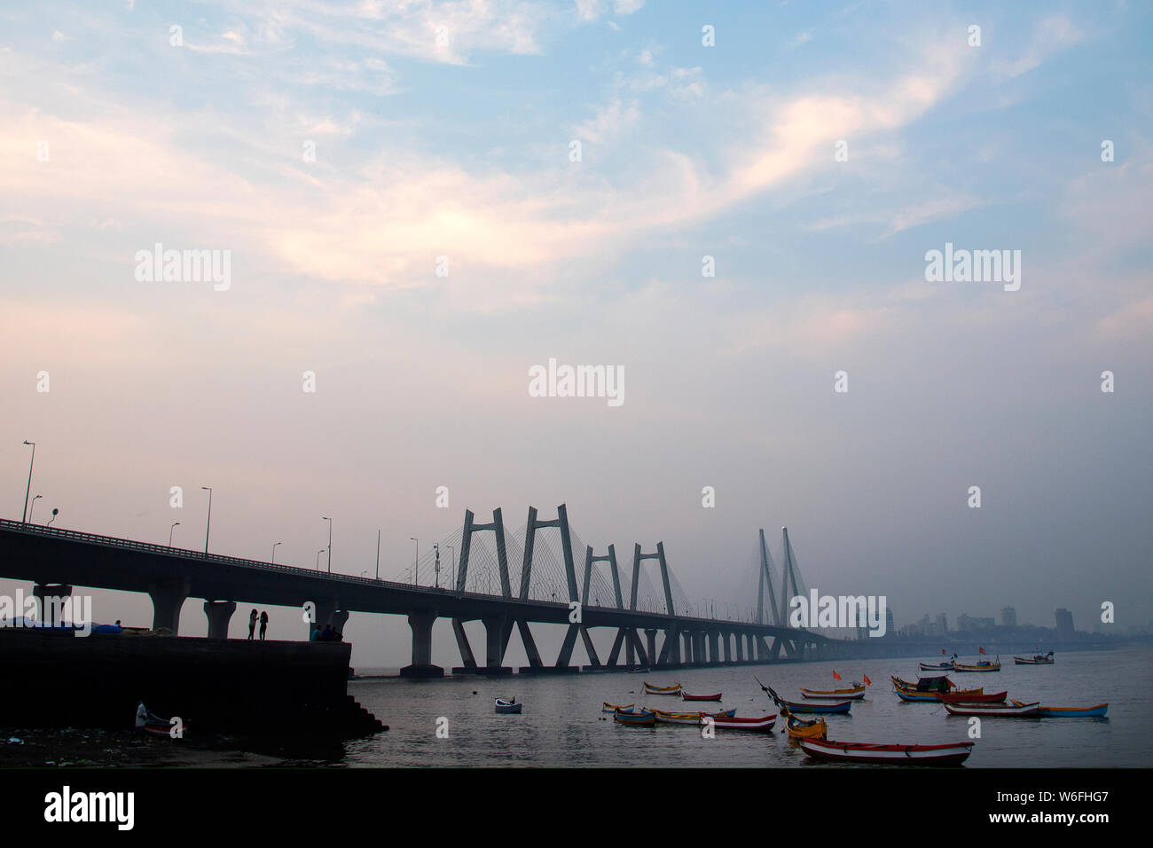 The image of Fishing boats and Worli bandra sealink bridge, at Mumbai, India Stock Photo