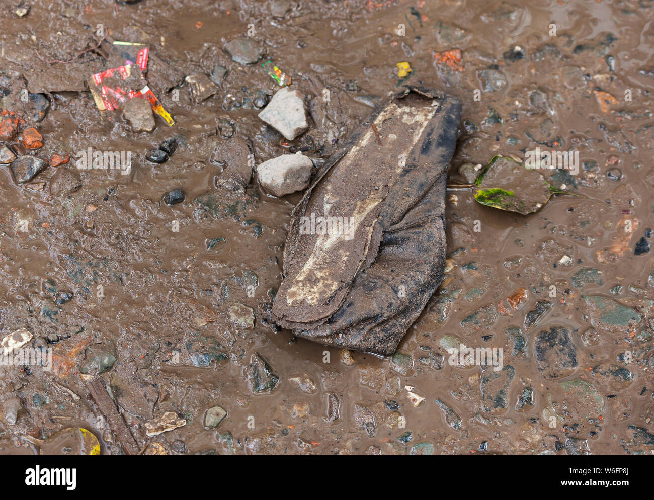 Single shoe found in Kathmandu near a collapsed building after the earthquake, 2015. Stock Photo