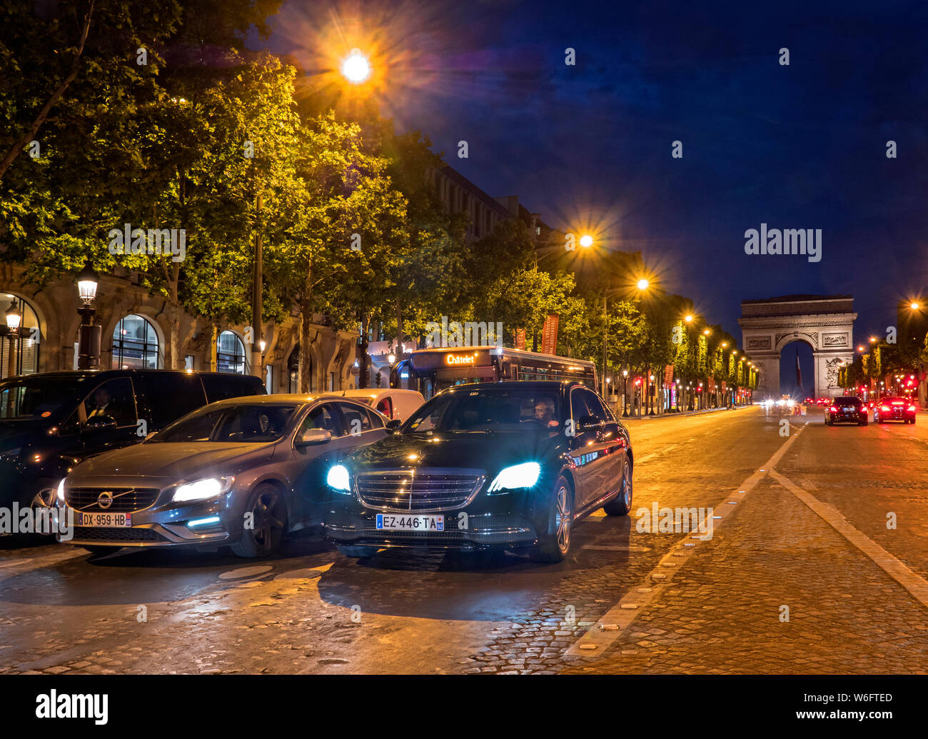 Night traffic on the Champs Elyse Paris. Stock Photo