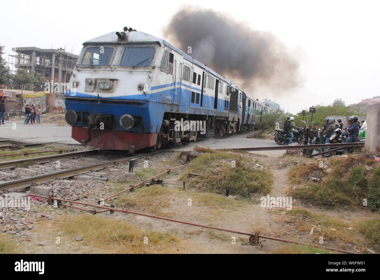 Train on railroad track, New Delhi, India Stock Photo Alamy