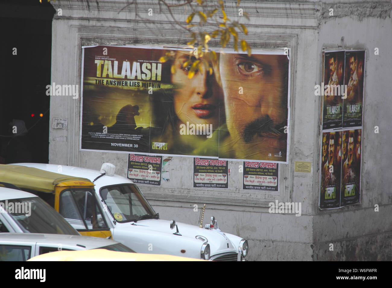 Talaash movie poster mounted on wall, India Stock Photo