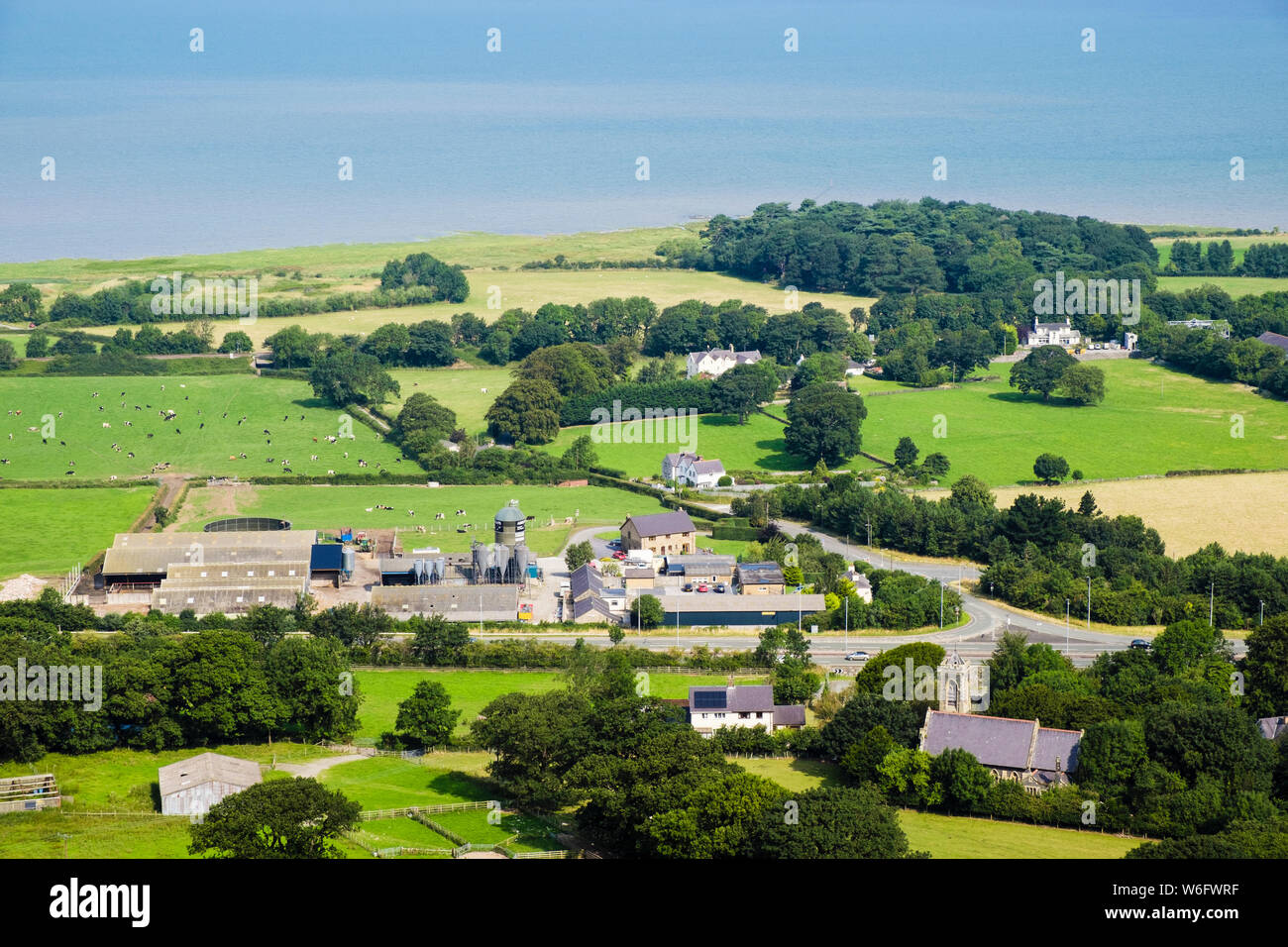 Looking down to Aber Falls Whisky distillery on Welsh north coast seen from hillside above Abergwyngregyn, Gwynedd, Wales, UK, Britain Stock Photo