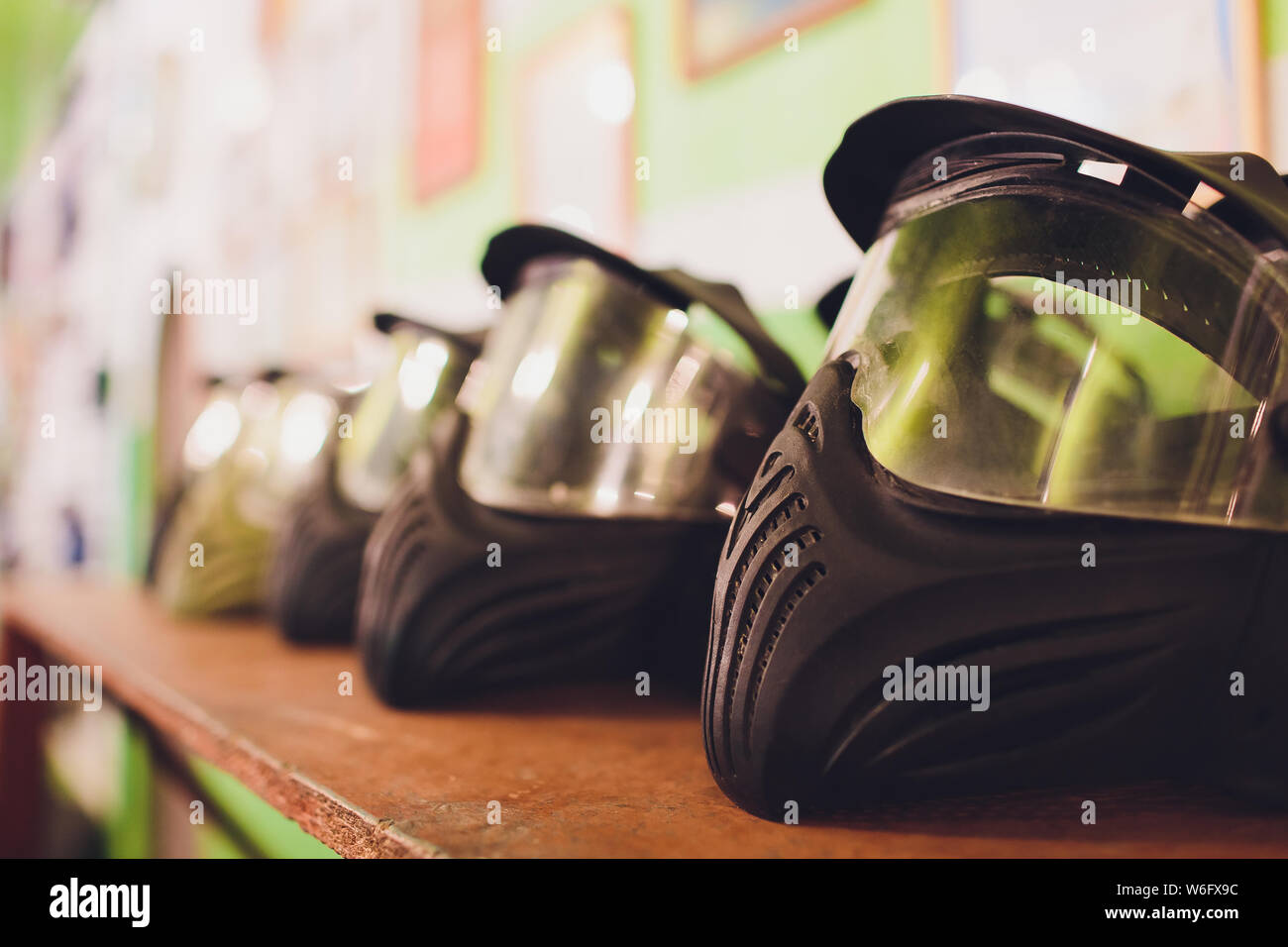 black and green paintball helmet. Mask, a helmet for a game in a